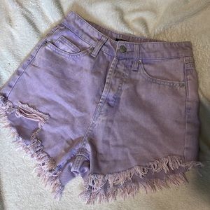 like new. wild fable size 00. light-washed ripped lilac purple shorts.